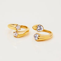 Gold crystal bypass ring heart and star versions clean white background