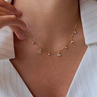 Crystal cherry charm necklace model shot from side