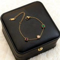 Multi-colour gemstone bracelet product shot on black box