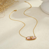 Shell chip heart pendant necklace pink variant side view